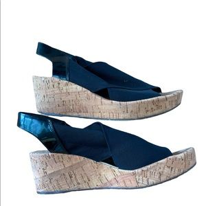 Beautiful German made wedges in black. Has open toe